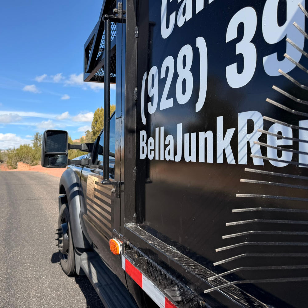 bella junk removal truck side view