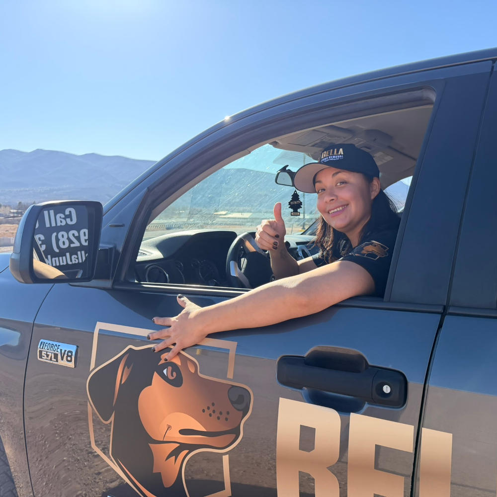 victoria in the bella junk removal truck