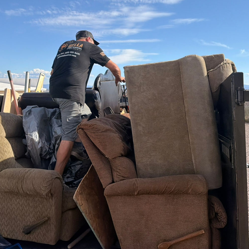 Bella Junk Removal crew loading furniture during a Verde Valley estate cleanout