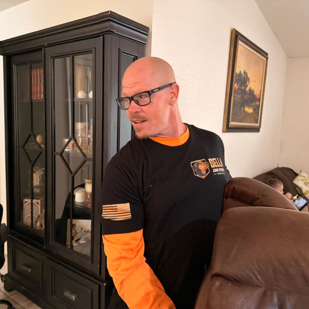 Bella Junk Removal crew providing junk removal Jerome AZ hillside home